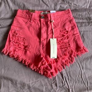 Pink high wasted distressed jean shorts